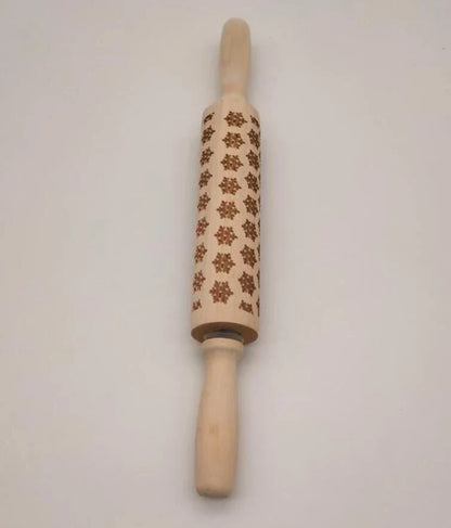 Personalized Christmas rolling pin with a variety of embossed holiday designs, including snowflakes, reindeer, and Merry Christmas patterns