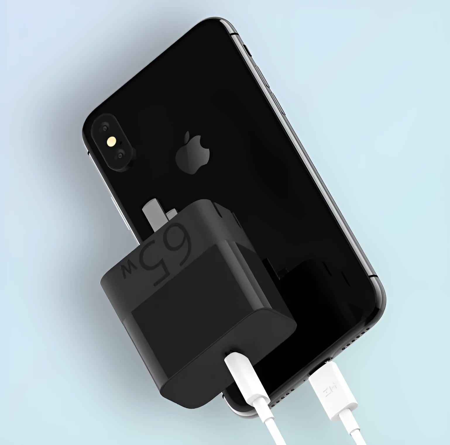 Black ZMI 65W USB-C notebook power adapter with compact design.
