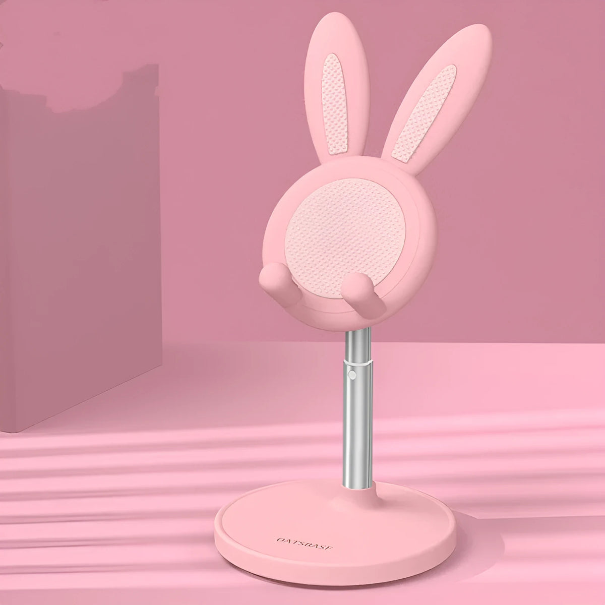 Rabbit-shaped silicone phone stand in pink, green, or white with adjustable scalable desktop holder