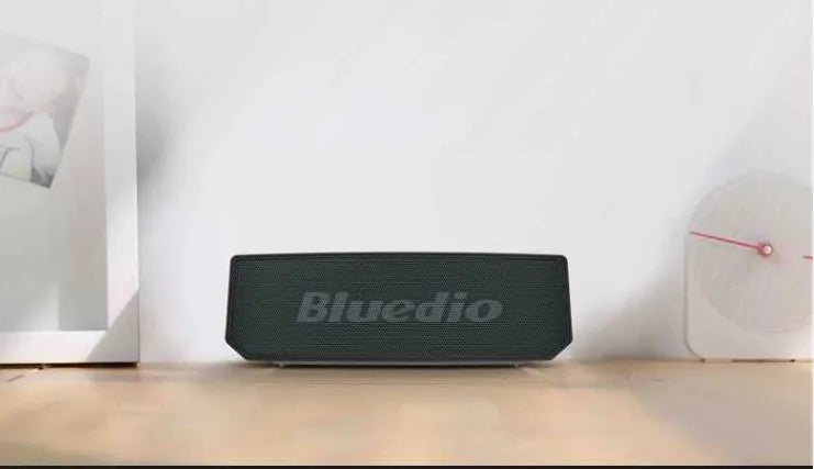Black Bs-6 cloud smart speaker showing compact design with micro-USB port