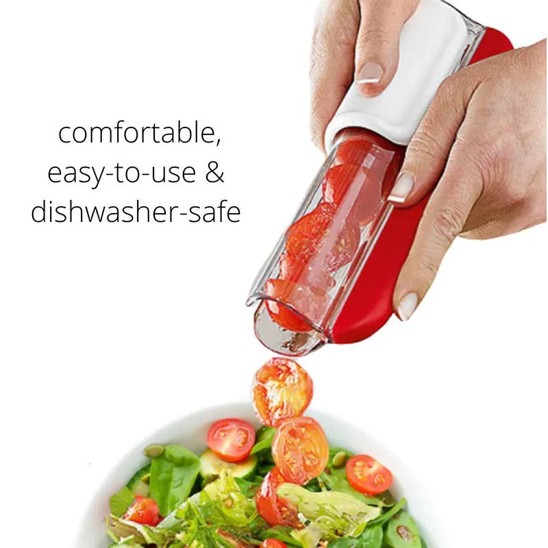 Handheld tomato and grape slicer in green with concealed stainless steel blade on a white background