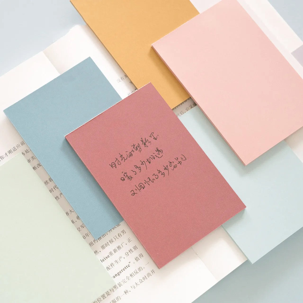 Large 12cm by 8cm colourful Post-it notes showing six different colours in a self-adhesive sticky note pack