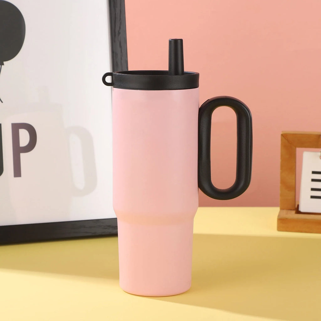 Large insulated portable straw cup with carry handle and straw in multiple colour options.