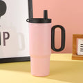 Large insulated portable straw cup with carry handle and straw in multiple colour options.