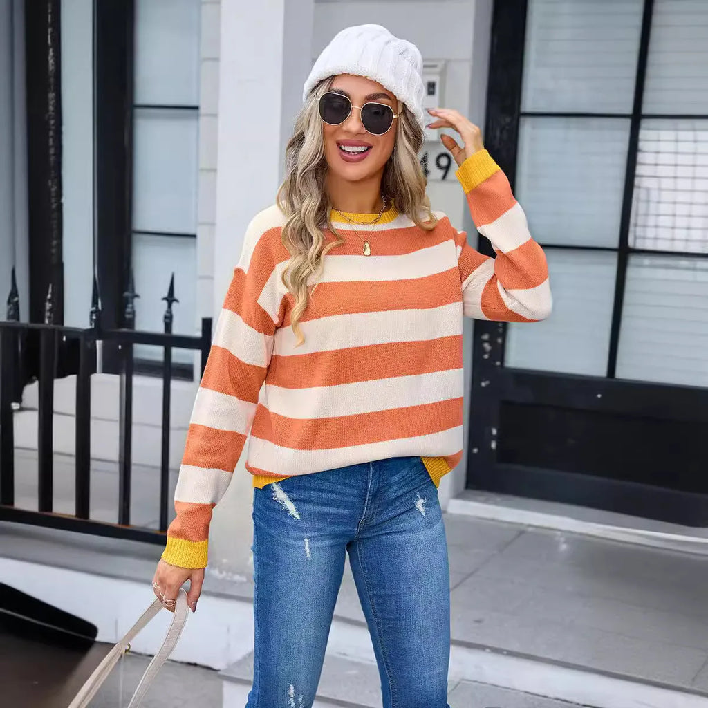 Women's loose long sleeve acrylic sweater in blue with a stripe pattern