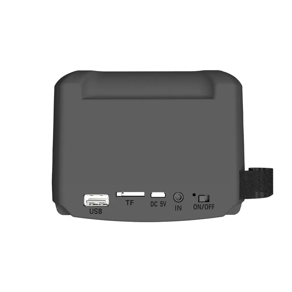 Small portable Bluetooth speaker in colour 3107 with USB charging cable.