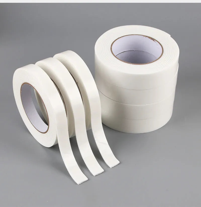 Roll of 3mm thick foam double-sided adhesive tape showing sponge core, with size options 15mm, 18mm, and 30mm wide.