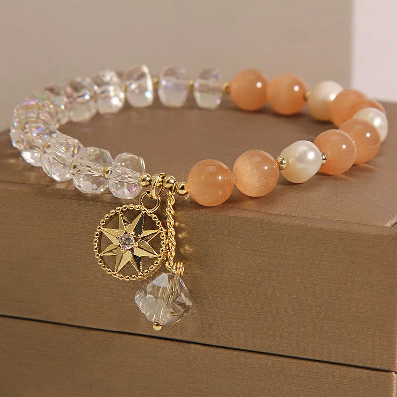 Orange eight-point star opal crystal bracelet with gold-plated settings