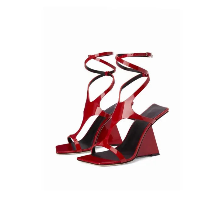 Women's black high heel sandals with a 9.5cm block heel and square toe design on a white background.