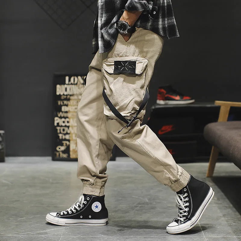 Men's cotton cargo pants in grey with multiple pockets, regular fit, side view