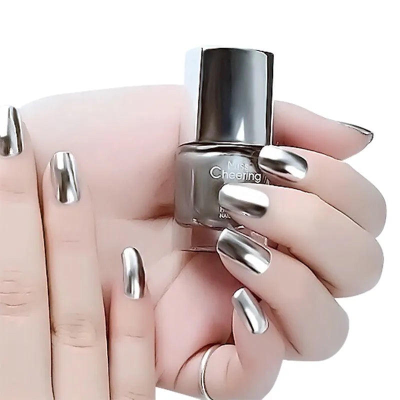 Mirror Nail Polish bottle with brush applicator for reflective metallic silver-tone nail finish