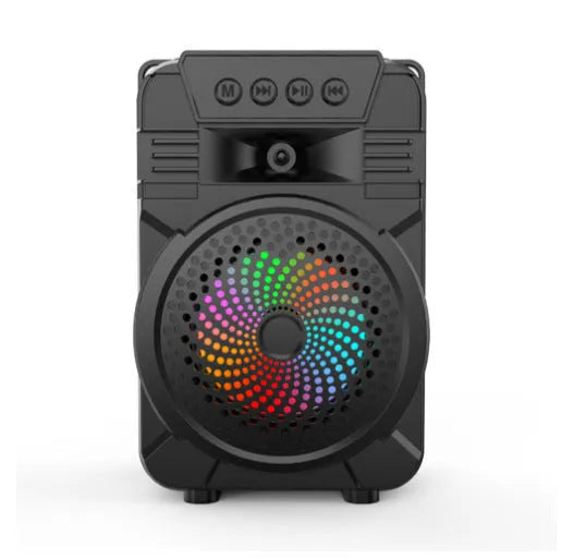 Black portable Bluetooth speaker with microphone and subwoofer on outdoor setting