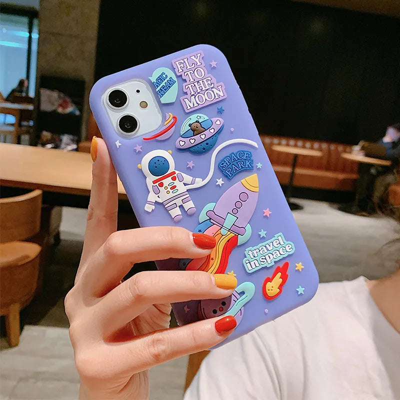 Purple translucent silicone iPhone case featuring a cartoon astronaut graphic.