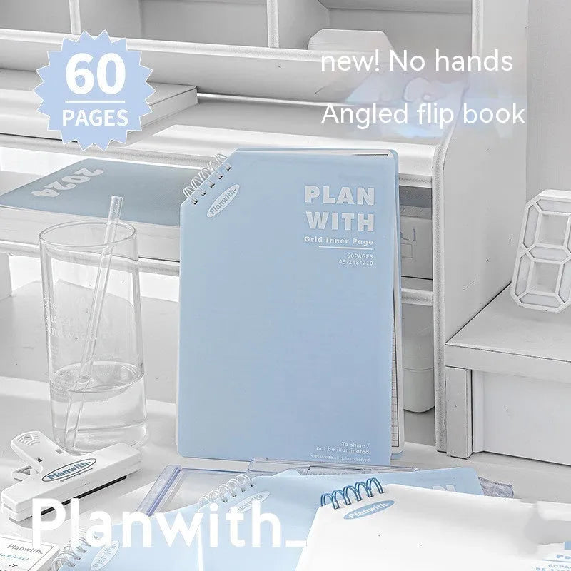 A5 and B5 draft notebooks with white, plaid, and blue covers for student art projects.