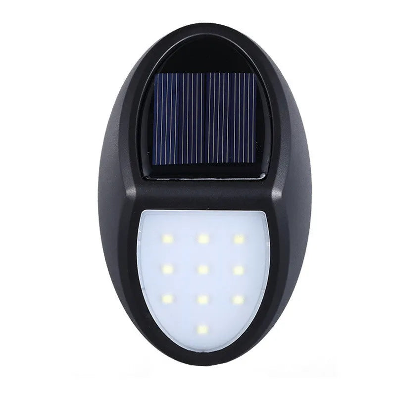 Black compact square solar-powered LED wall light for outdoor use.