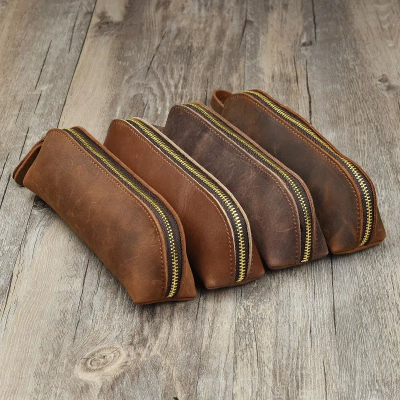 Square handmade cowhide leather pencil case with zipper in black, brown, dark brown, or yellow.