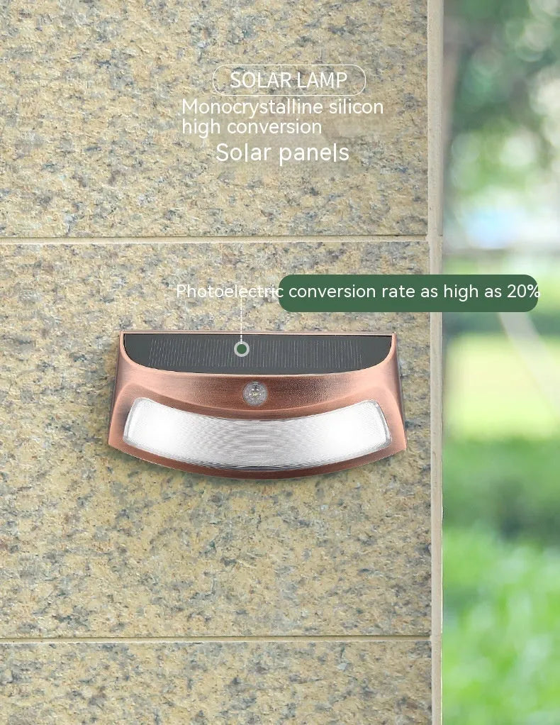 Solar-powered smiling face wall lamp for outdoor garden and courtyard lighting