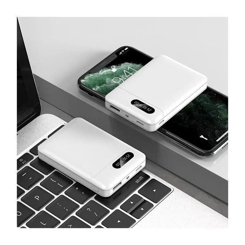 White or black plastic portable power bank with USB ports showing dimensions 92mm x 63mm x 23mm