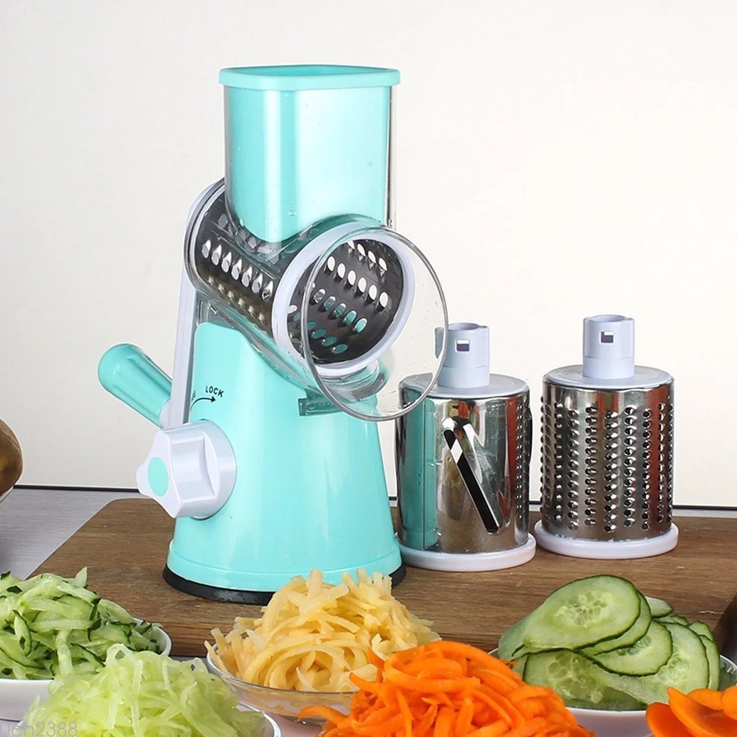 Mandoline slicer vegetable cutter with three stainless steel blades in blue green colour