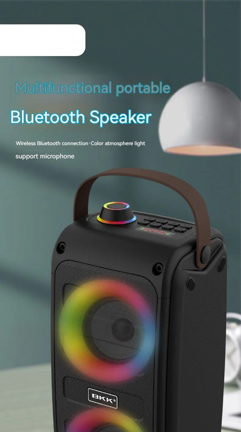 Portable Bluetooth speaker with colour light in black plastic shell, showing built-in speaker grille and button controls.