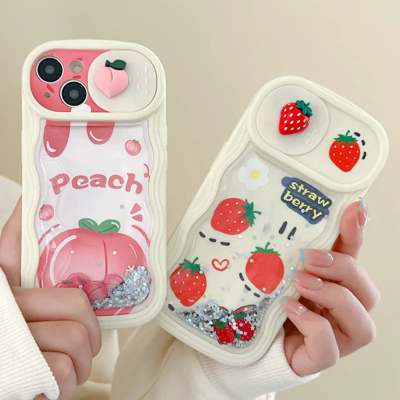 Fruit style quicksand phone case in quicksand peach, all-inclusive TPU design for iPhone, fall protection, cartoon elements.