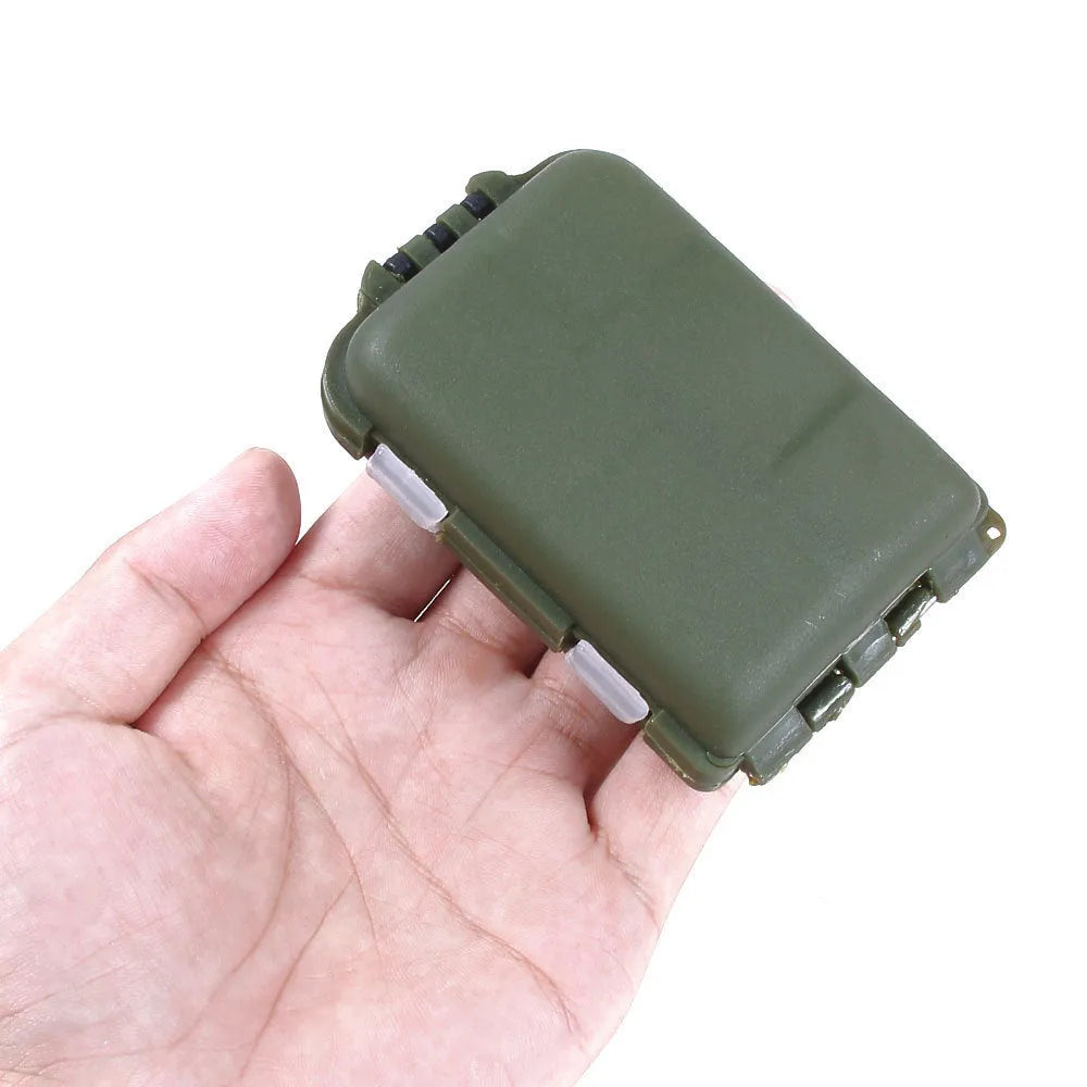 Black plastic storage box with ten internal compartments for fishing tackle.