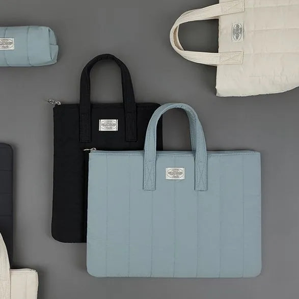 Personalised polyester laptop briefcase in milky white, shown with size options for 11, 13-14, and 15-15.6 inch devices.