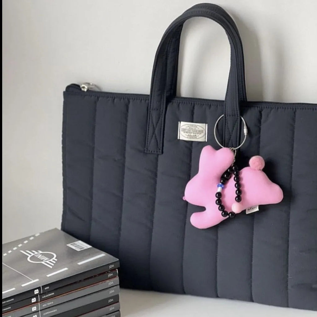 Personalised polyester laptop briefcase in milky white, shown with size options for 11, 13-14, and 15-15.6 inch devices.