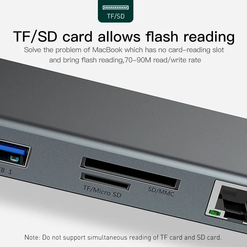 Grey aluminium docking station with cooling bracket showing ten ports including HDMI VGA and network connections