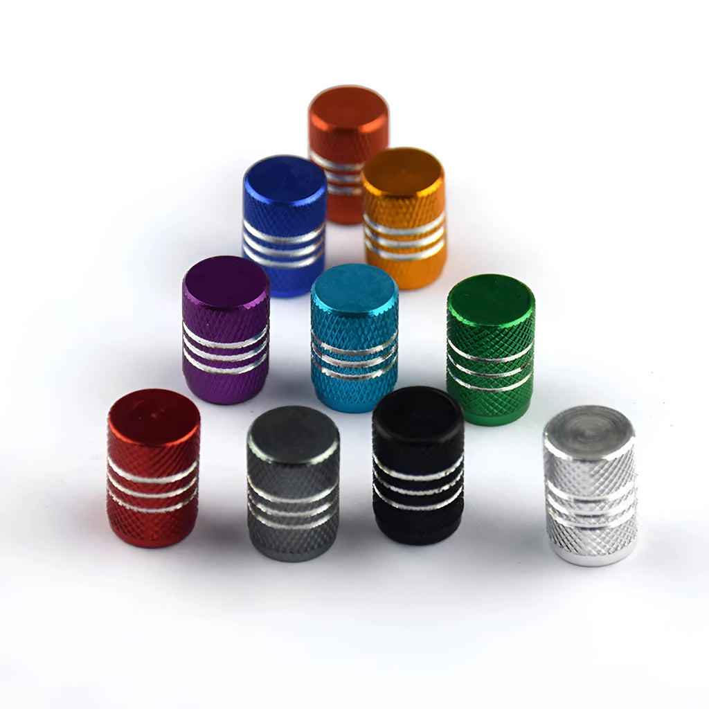 Set of aluminium alloy car tyre valve caps in multiple colours including red, blue, silver, and black.