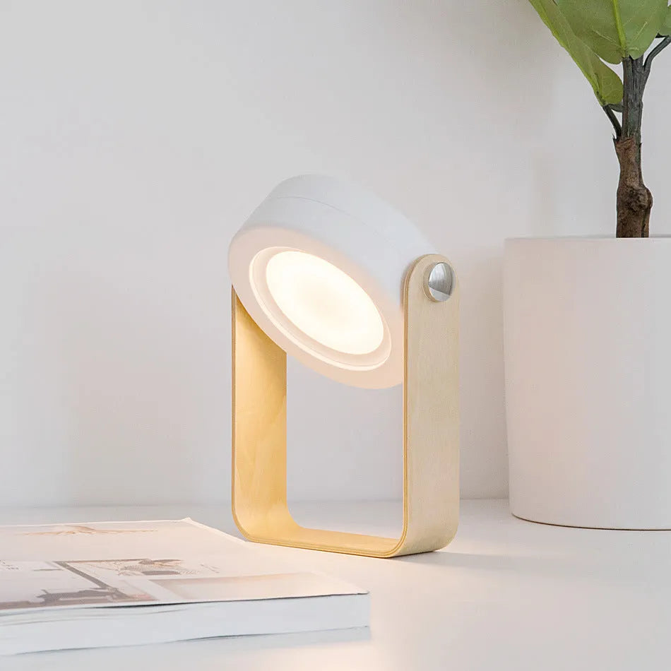 White foldable USB rechargeable LED lantern lamp shown in both table and upright night light modes.