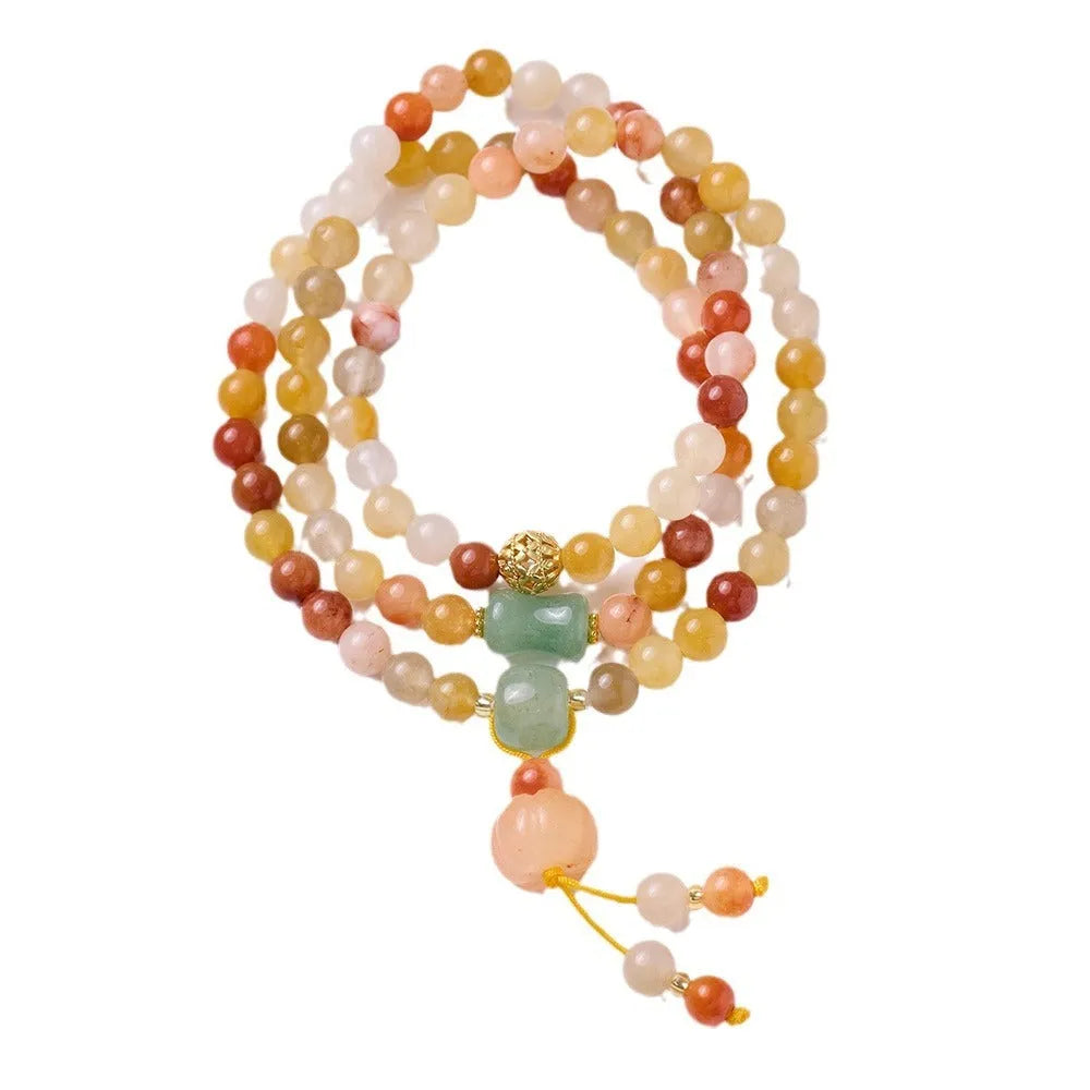Women's Jinsi Jade bracelet with three pumpkin beads and tassel decoration on wrist