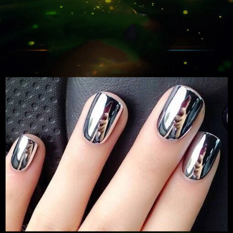 Mirror Nail Polish bottle with brush applicator for reflective metallic silver-tone nail finish