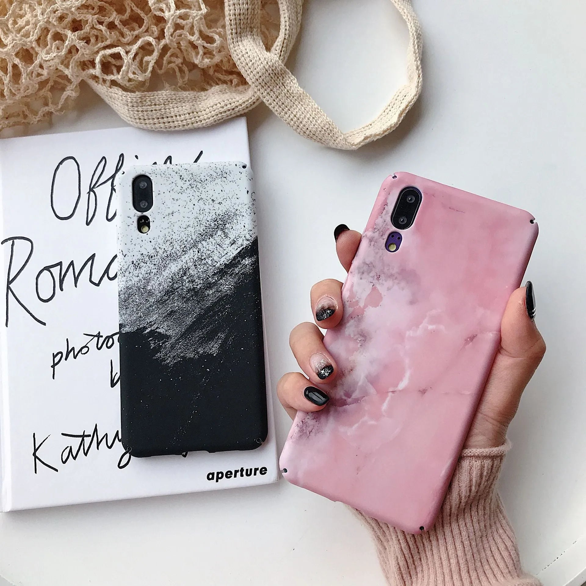 Painted solid colour phone case for Honor and Huawei smartphones in black or pink.