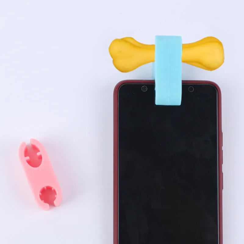 Silicone pet selfie camera lens clip in blue or pink, a sounding toy for cat and dog photos