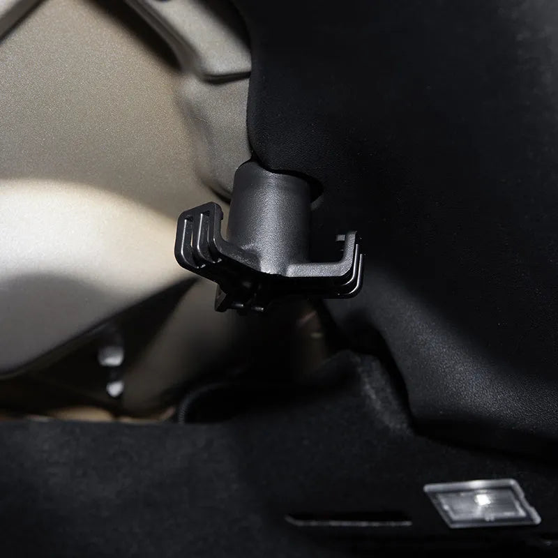 Black ABS trunk hooks for Tesla MODEL3 2019-2020 showing two hooks