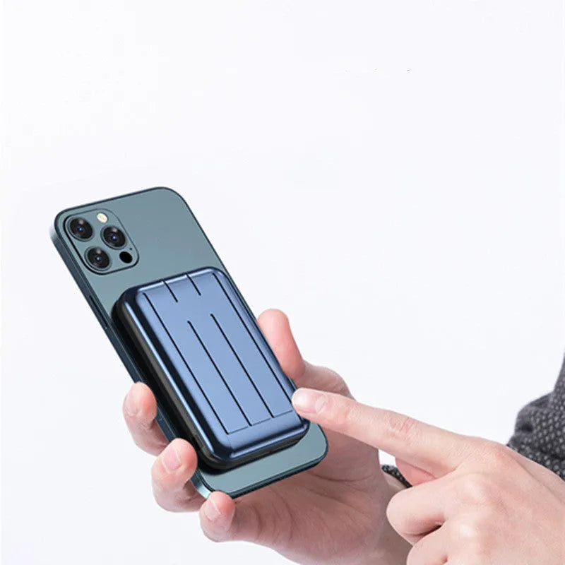 Blue 15W wireless magnetic power bank with 5000mAh capacity next to a smartphone