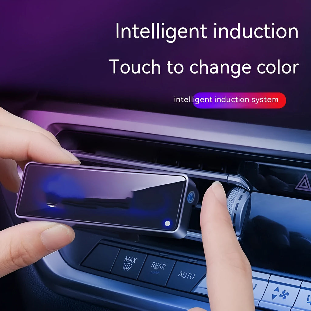 Black car air vent aromatherapy unit with LED lights and fragrance stick slot