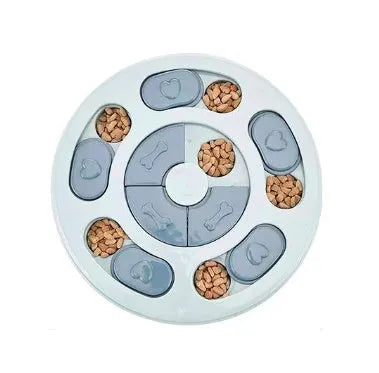 Dog eating interactive stuffy toy slow feed bowl in blue with non-slip base and small food sections