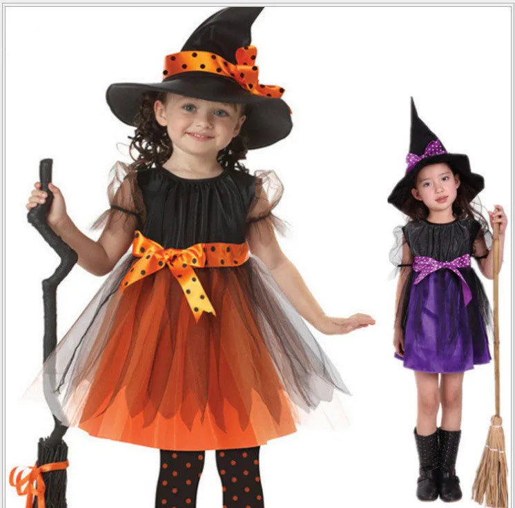 Child's purple and yellow witch costume with bat and broom designs, made from linen-blend fabric.