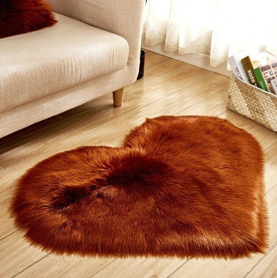 Soft and plush heart-shaped rug in various colors, perfect for cozy home decor