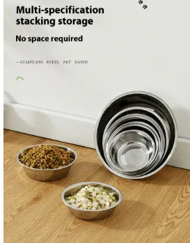 Stainless steel pet food bowl with non-slip base on a kitchen floor