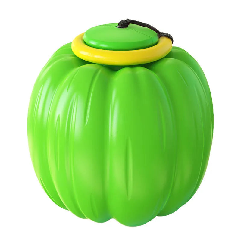Green, orange, and yellow plastic pumpkin-shaped dog ball with squeaker for small dogs.