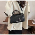 Large capacity women's PU handbag in brown with 26x13x17cm dimensions