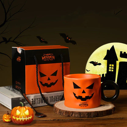 Festive Halloween pumpkin-shaped ceramic mugs in orange and white colors