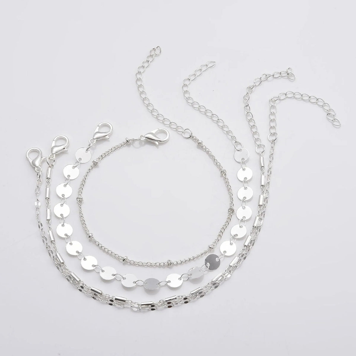 4-pack geometric bracelet set in gold or silver, tube chain disc lace styles, 16cm plus 5cm extension