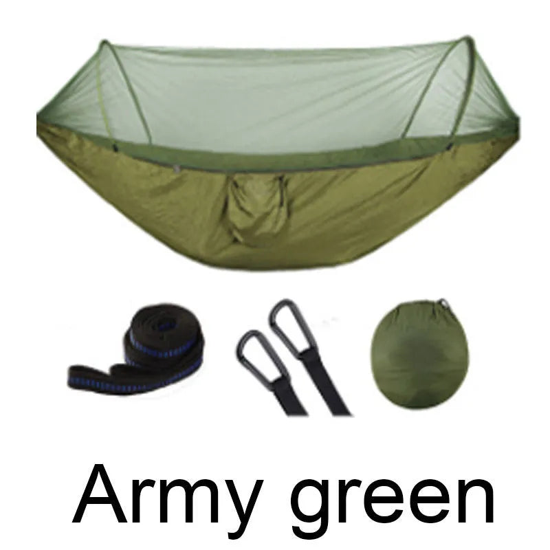 Double hammock bed 260x150cm in Army Green with mosquito-blocking mesh on a camping site