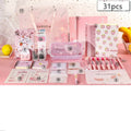 Stationery gift bag with B5 and A5 notebooks, pens, correction tape, clips, ruler, and decorative accessories