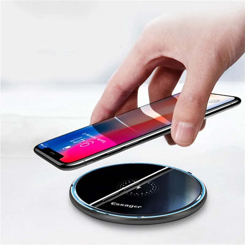 Black wireless charging pad with LED indicator for phones and headphones
