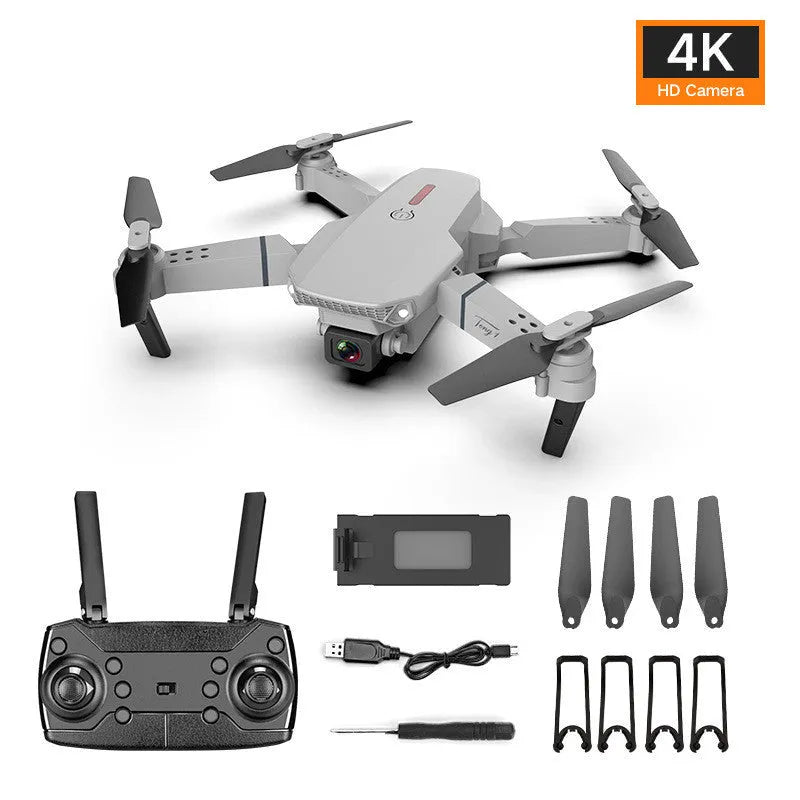 Grey foldable 4K dual camera aerial drone with remote controller and accessories
